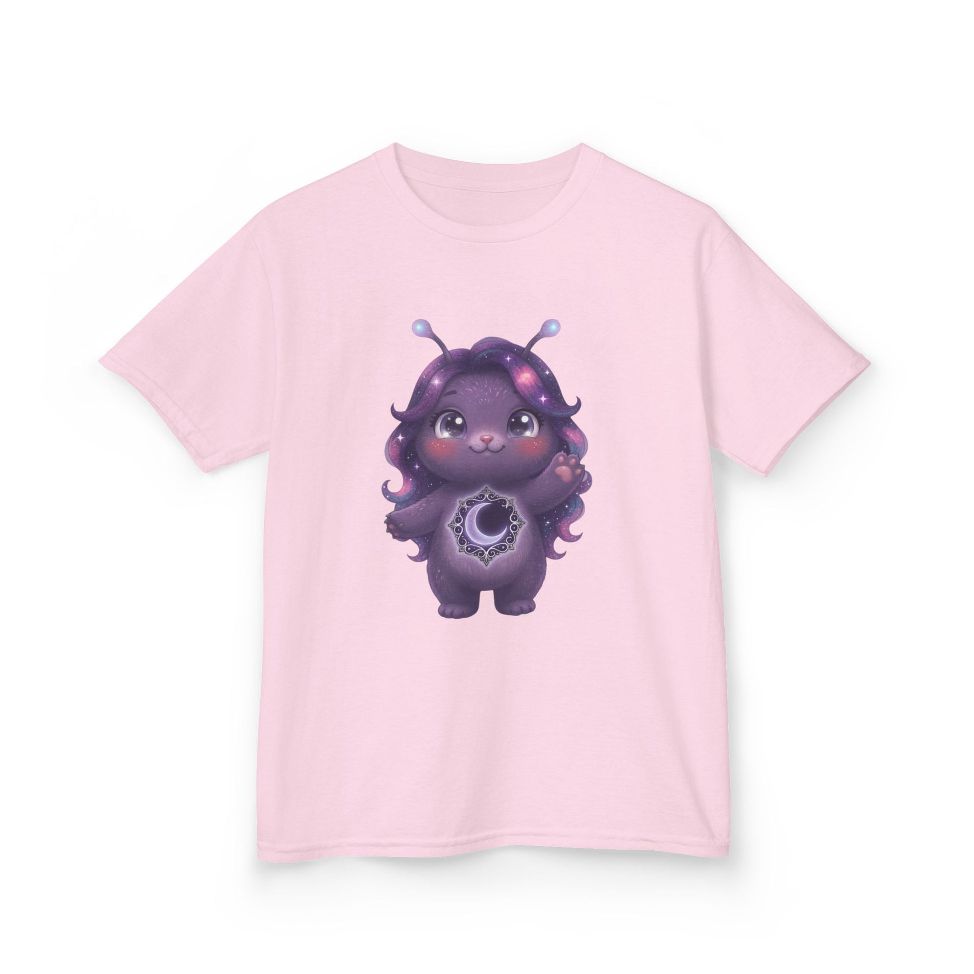 Light pink crew-neck t-shirt featuring a cute purple galaxy creature with antennae, long wavy hair, and a glowing crescent moon emblem on its chest.