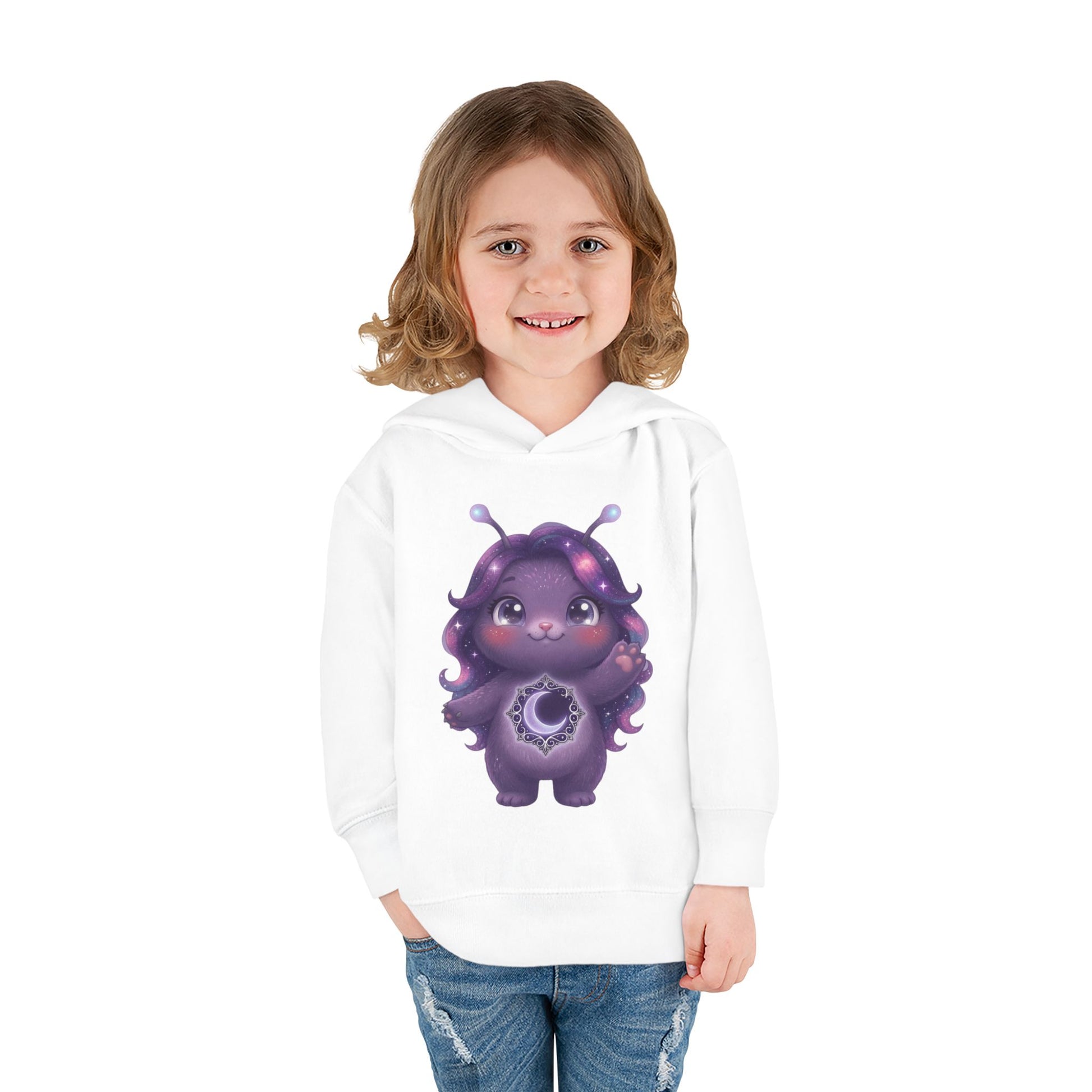 White hoodie featuring a cute purple galaxy creature with antennae, long wavy hair, and a glowing crescent moon emblem on its chest.